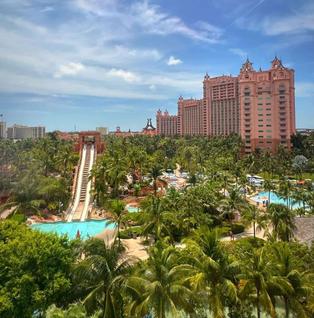 Atlantis Resort in Nassau, Bahamas, featuring a water slide and palm trees