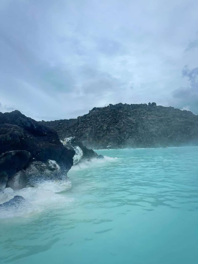 Blue Lagoon geothermal spa near Reykjavik with volcanic rock formations.