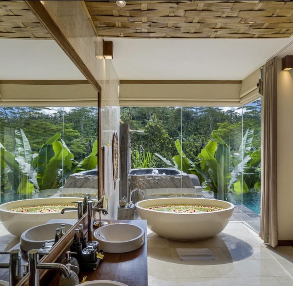 Luxurious Bali bathroom with soaking tubs and jungle view