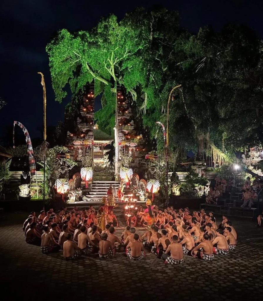 Balinese Kecak dance performance at night in front of a temple