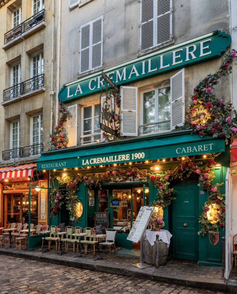 La Cremaillere 1900 restaurant in Paris, with green facade and floral decorations