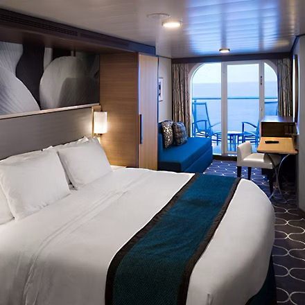 Cruise ship cabin with a balcony and ocean view