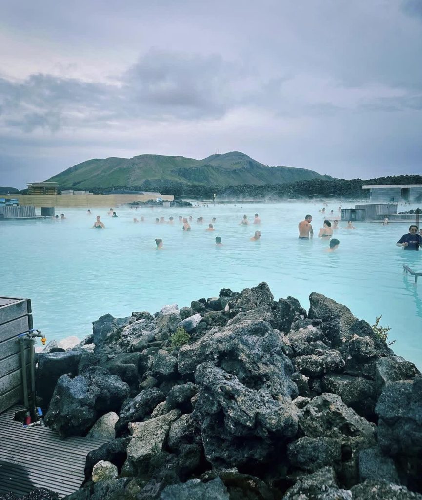 Group of people swimming in the Blue Lagoon geothermal spa in Iceland