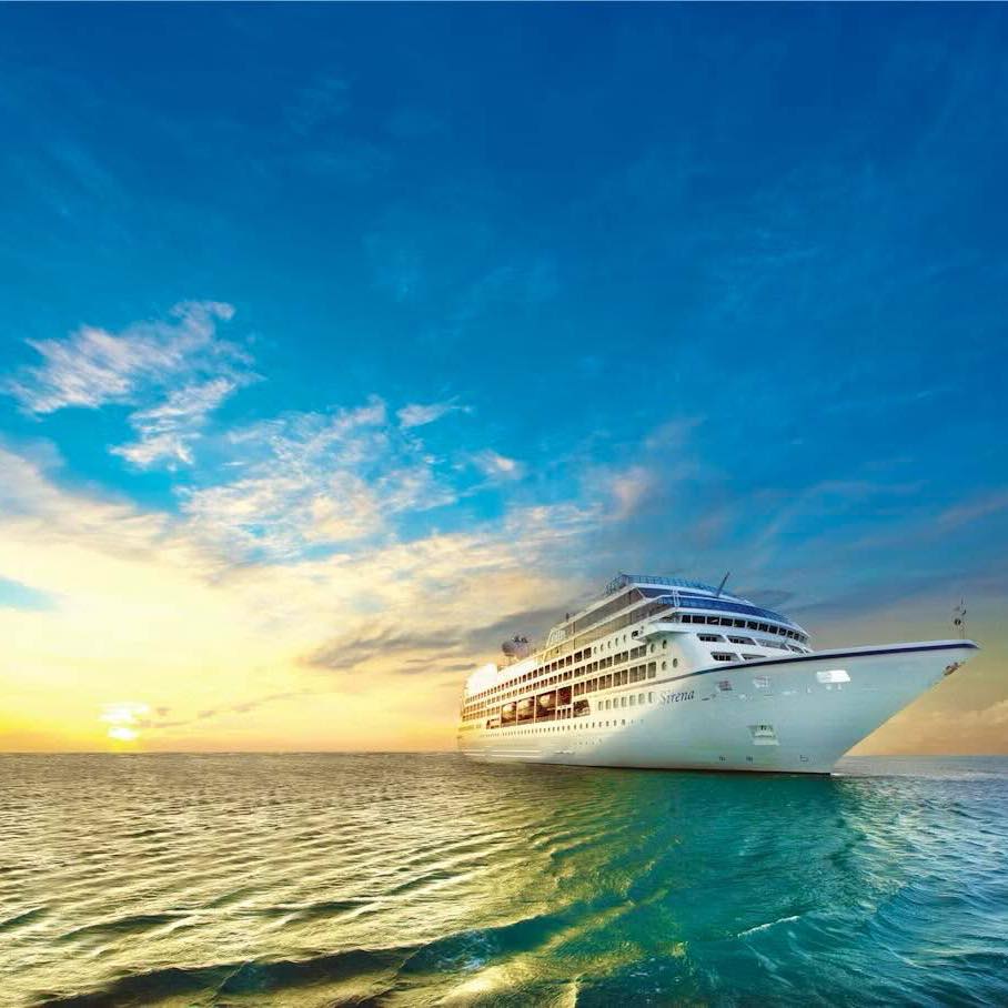 Serena cruise ship sails on calm ocean at sunset